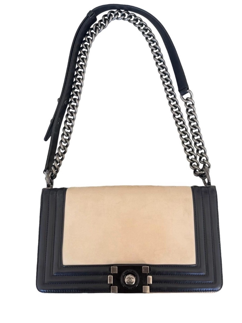 Chanel Boy Bag in a two-tone black and beige color structured chain strap